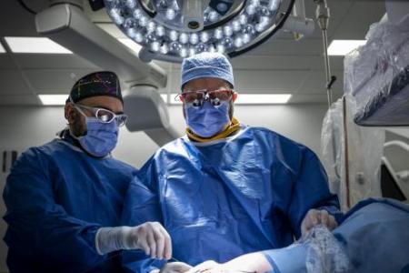 surgeons in operating room
