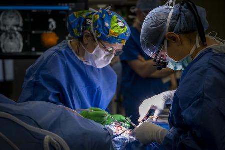 Doctors preforming surgery