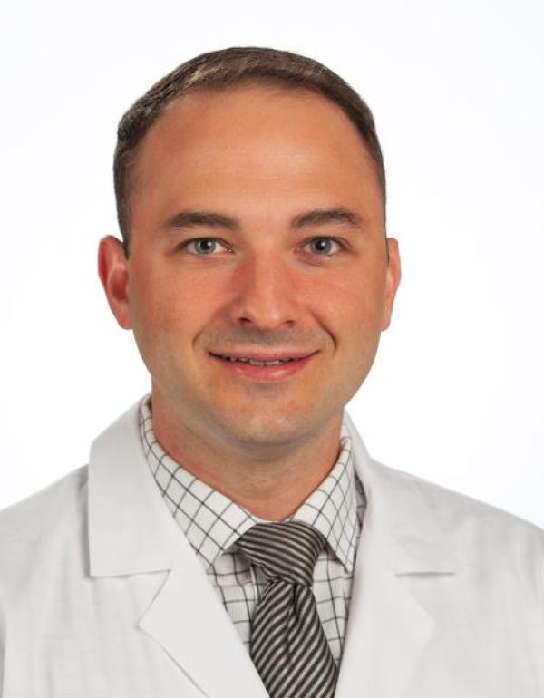 Dr.  Chris Pasarikovski 