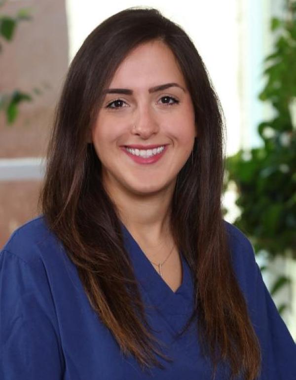 Dr.  Mina Tohidi