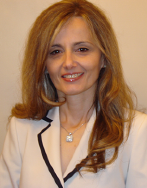 Dr.  Mila Kolar
